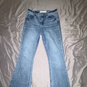 Indigo Rein High Rise Flare Jeans Light Wash Raw Hem Denim